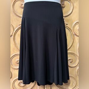 I.e. woman black slinky skirt